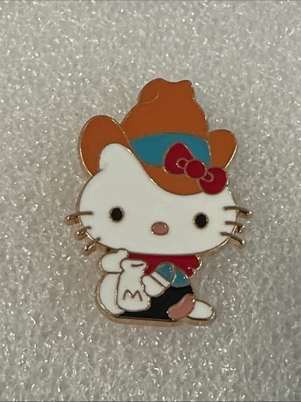 Hello Kitty Pin with Orange Cowboy Hat and Red Bow